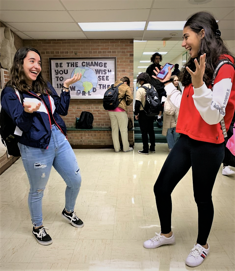 Liana Vargas, 11, and Brianna Alvarez, 11, are excited to see each other before first period 