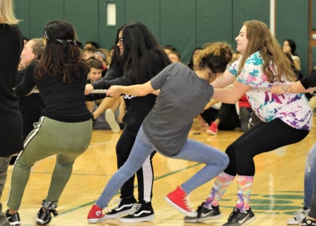 From left to right, Ananya Chandra, Shivani Ghatak, Isabella Pereira, and Alex Simos represent their classes for the final girls tug of war.