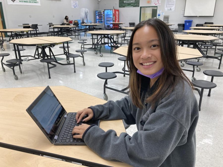Emma Pusung, 12, works on her AP Literature assignment early in the morning during study hall. 
