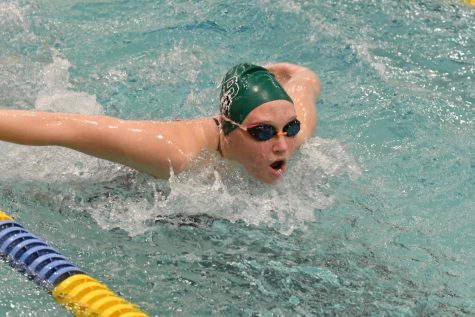 Katie Ryan, 10, swims her way to victory in the 50 free. 