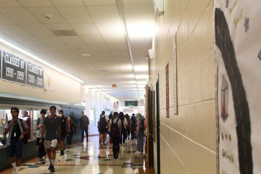 Students walking through the halls during the morning.