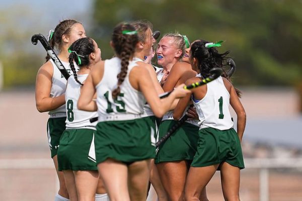 The Field Hockey team celebrates a win at the GMC Finals against South Plainfield.