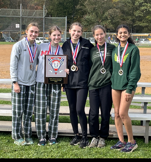 The varsity girls at the Sectionals meet at which they placed 2nd. Left to right: Allison Zeichner (10), Maddy Sauvigne (11), Hannah Oranchak (11), Valerie Malishuk (12), Ramya Chandra (10) 

